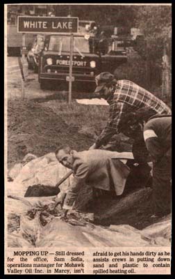 sam sofia ops manager of mohawk valley oil assists in clean up of spill october 1988